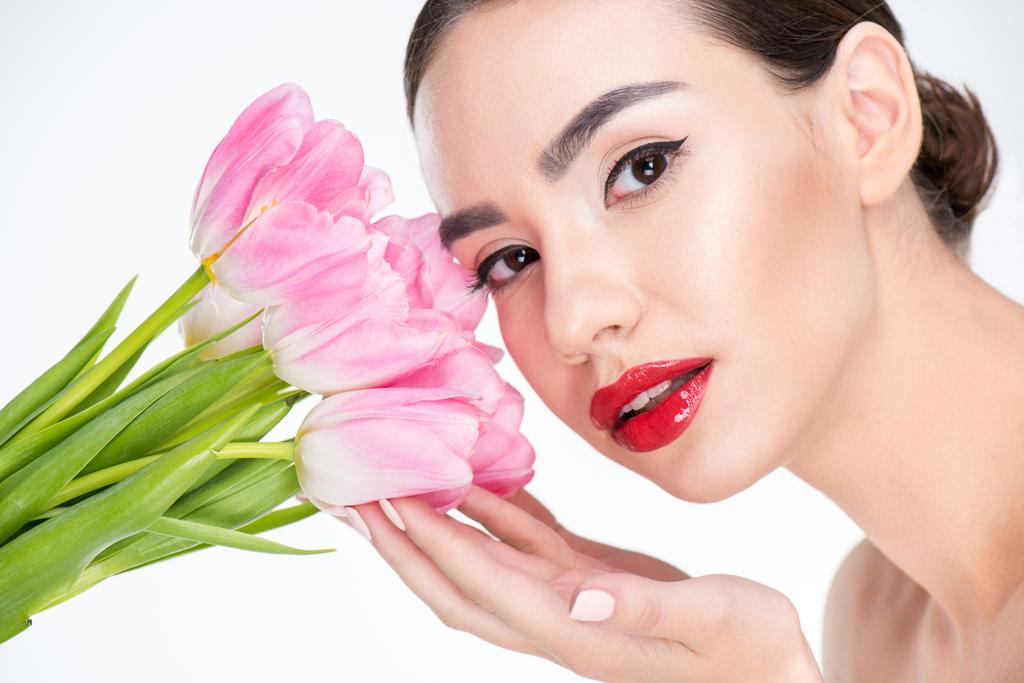 Femme avec bouquet de tulipes roses
 - Photo, image