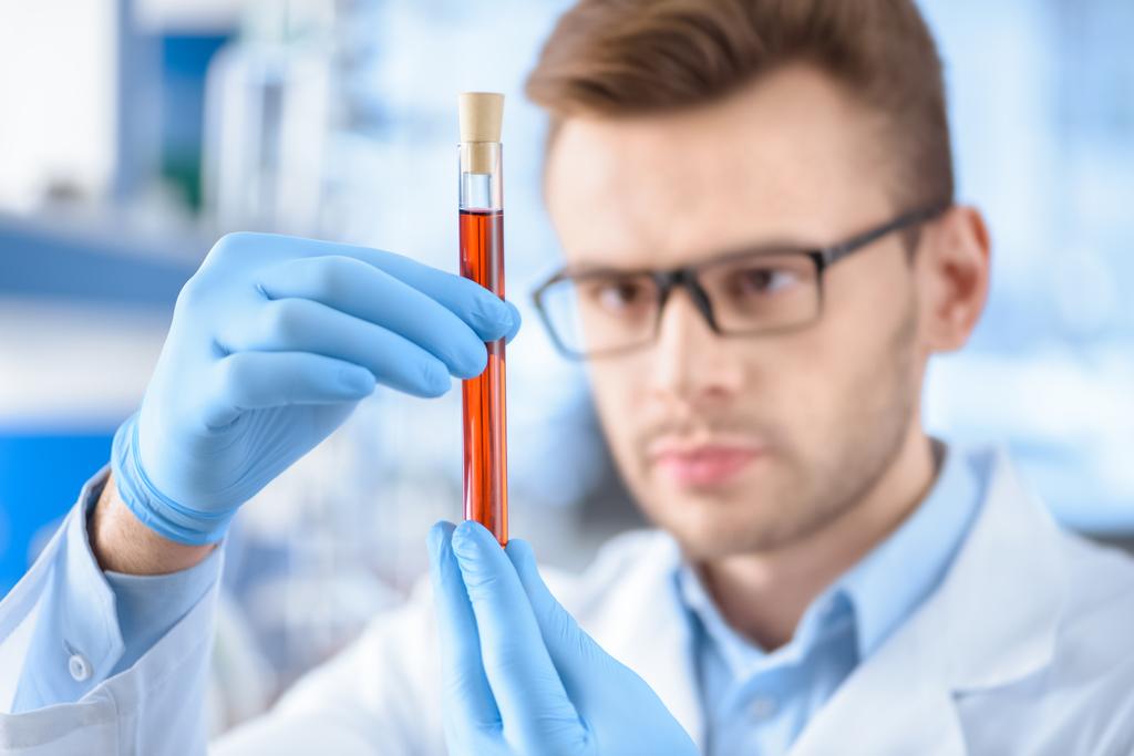 scientist with laboratory tube - Photo, Image