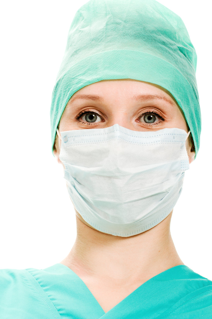 Cirurgião mulher em máscara protetora
 - Foto, Imagem