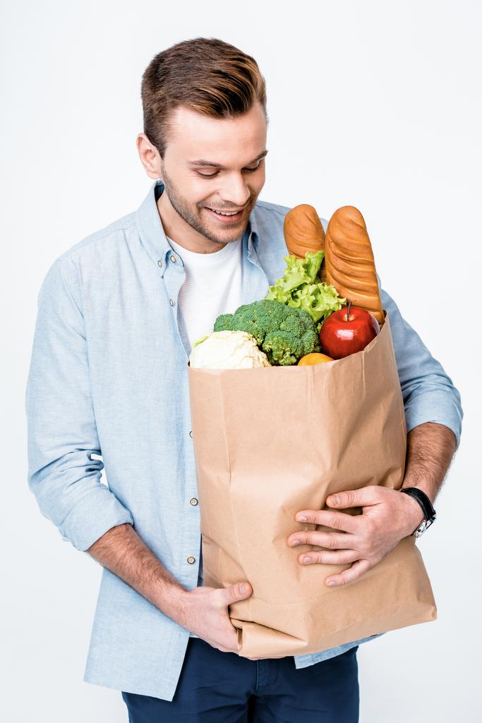 Mies ruokakassin kanssa - Valokuva, kuva