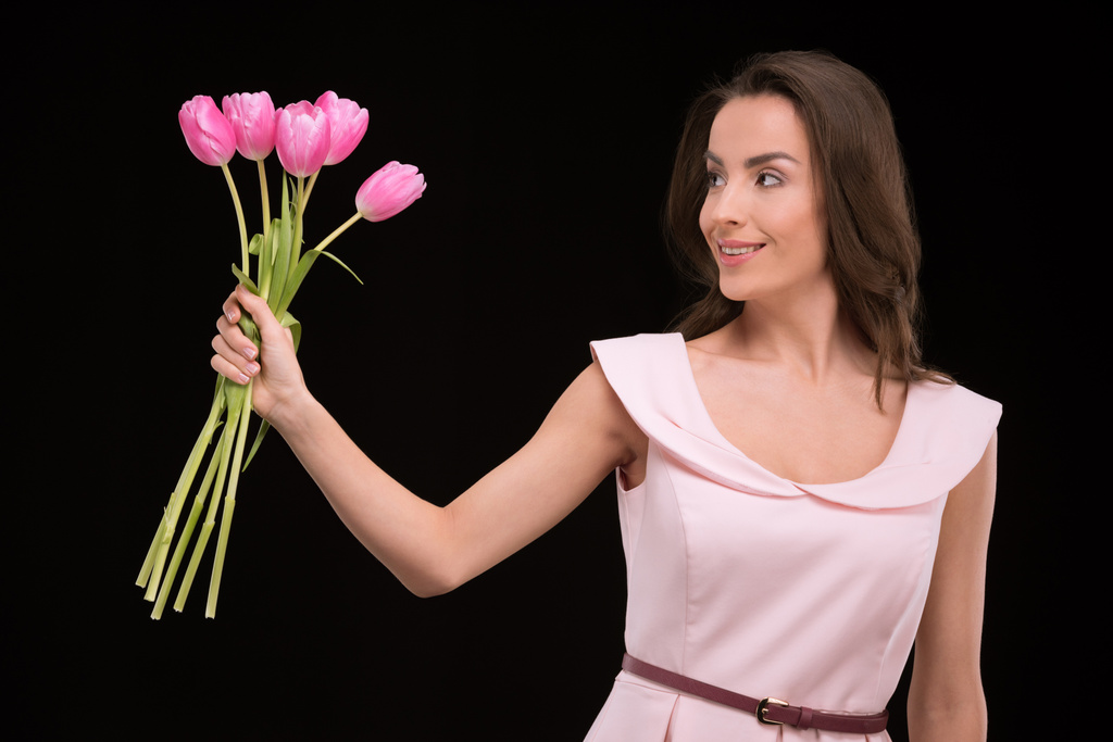giovane donna con tulipani  - Foto, immagini