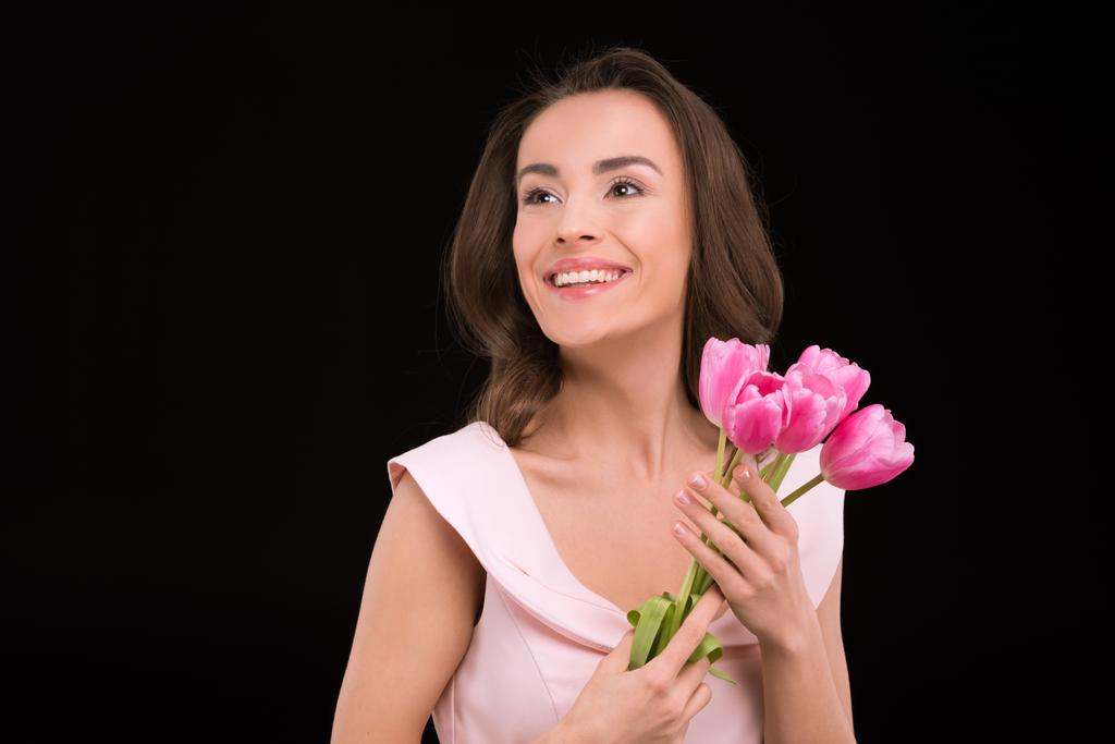 Молода жінка з тюльпанами
  - Фото, зображення
