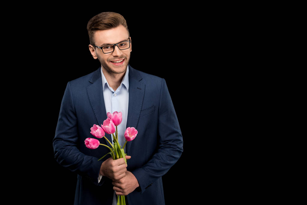 muž hospodářství tulipány - Fotografie, Obrázek