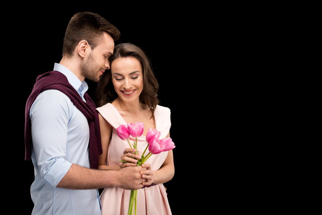 couple in love with tulips - Photo, Image