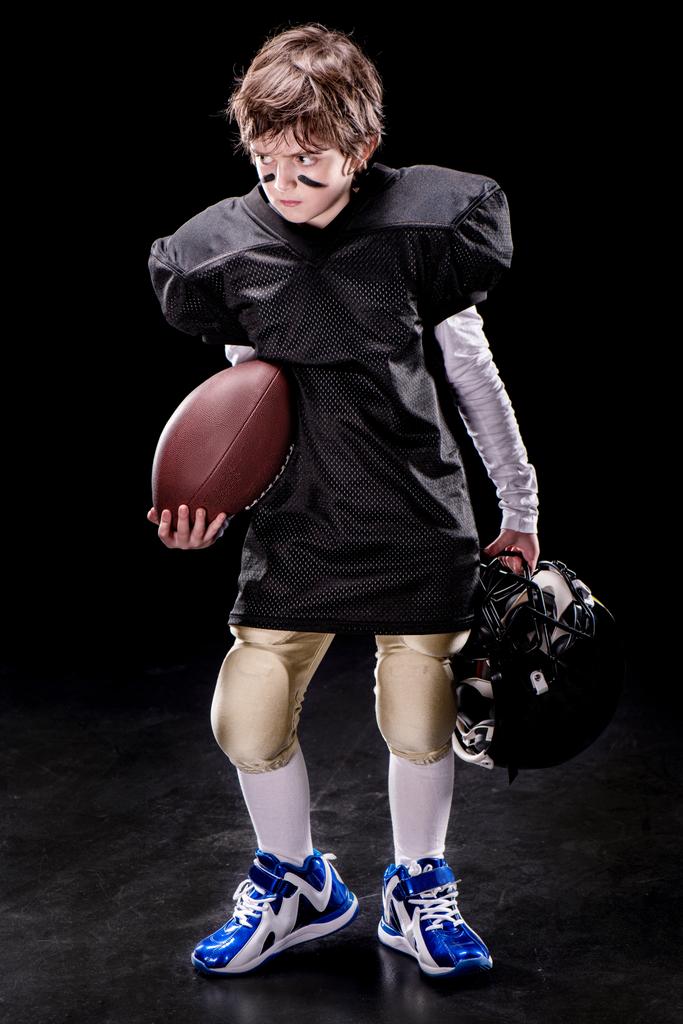 Garçon jouant au football américain
 - Photo, image
