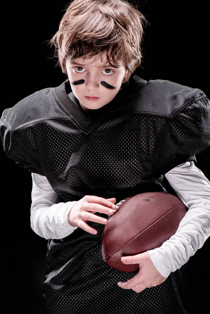 chłopiec gra futbol amerykański - Zdjęcie, obraz