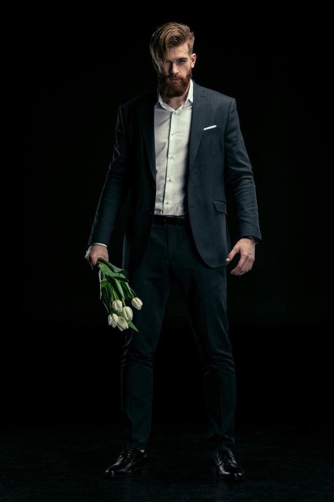 homem elegante com tulipas
 - Foto, Imagem