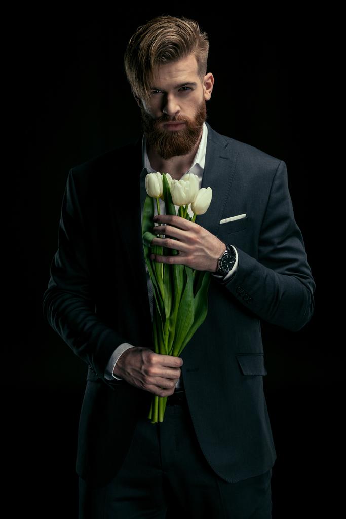 hombre con estilo con tulipanes
 - Foto, imagen