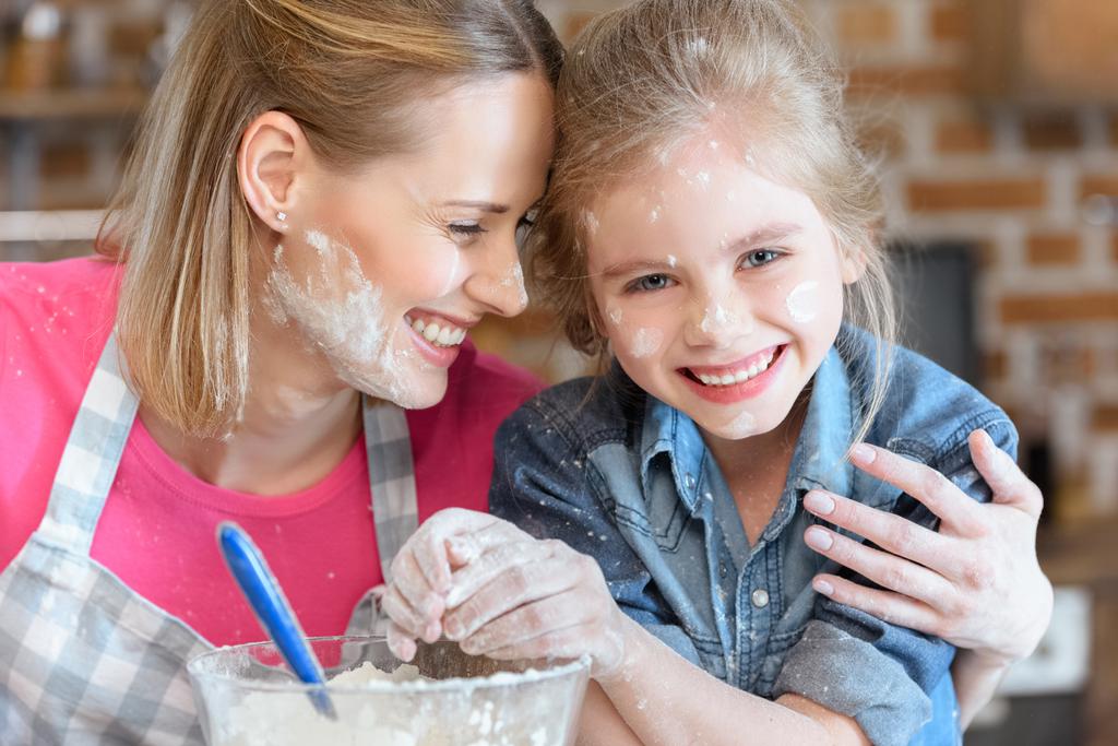 mother and daughter cooking - Photo, Image