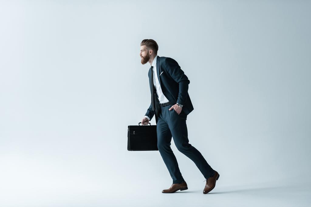 Hombre de negocios guapo con maletín
 - Foto, Imagen