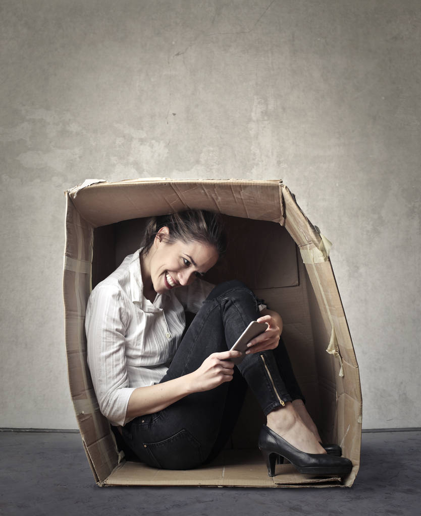 Mujer de negocios en caja
 - Foto, imagen