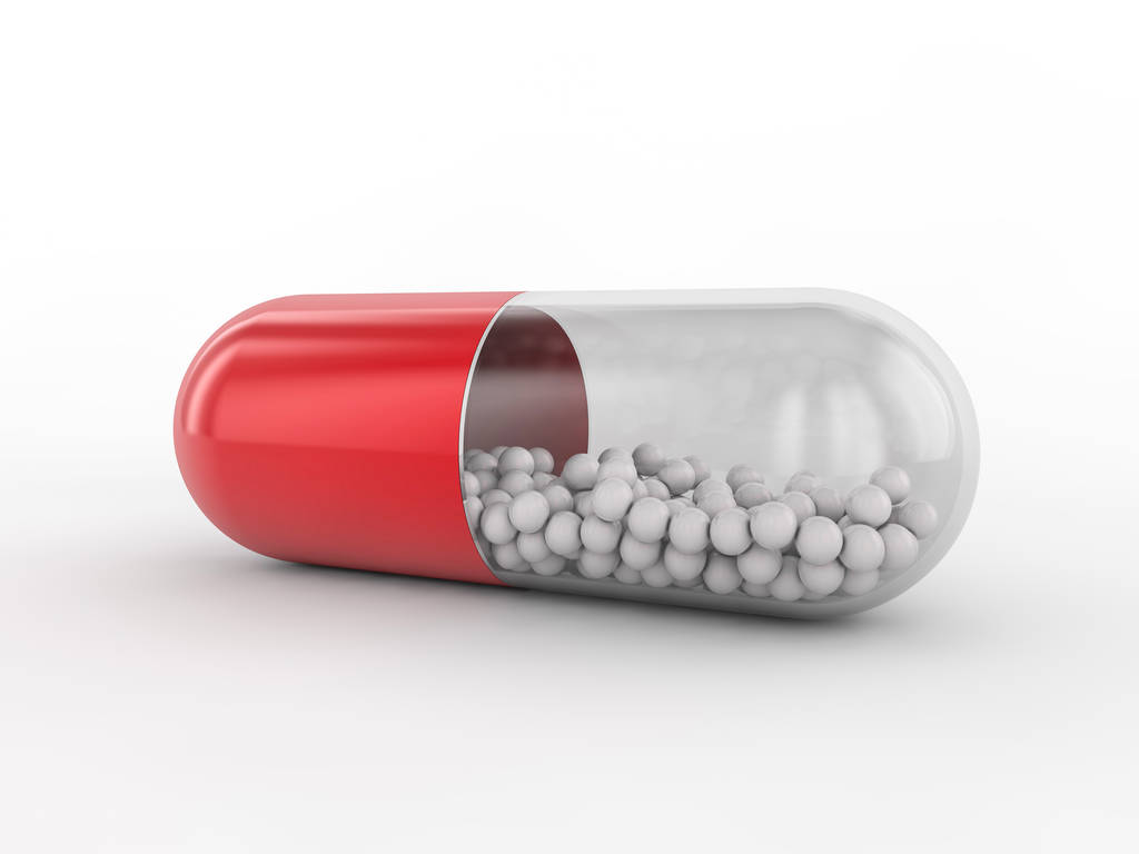 Capsule met medicijn op witte achtergrond. 3D-rendering - Foto, afbeelding