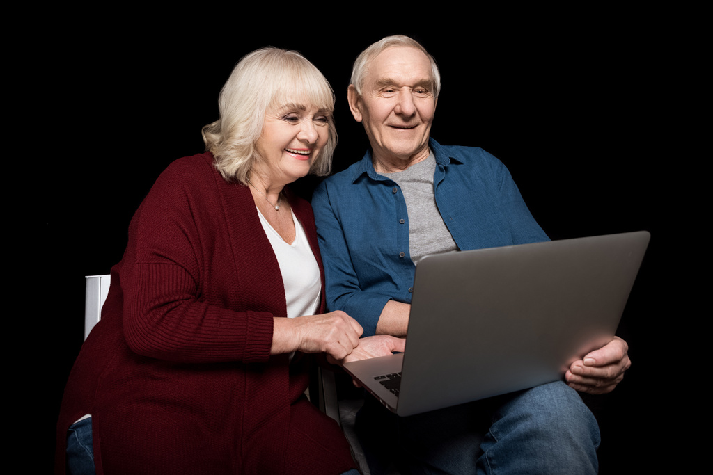 Senioren-Paar benutzt Laptop - Foto, Bild