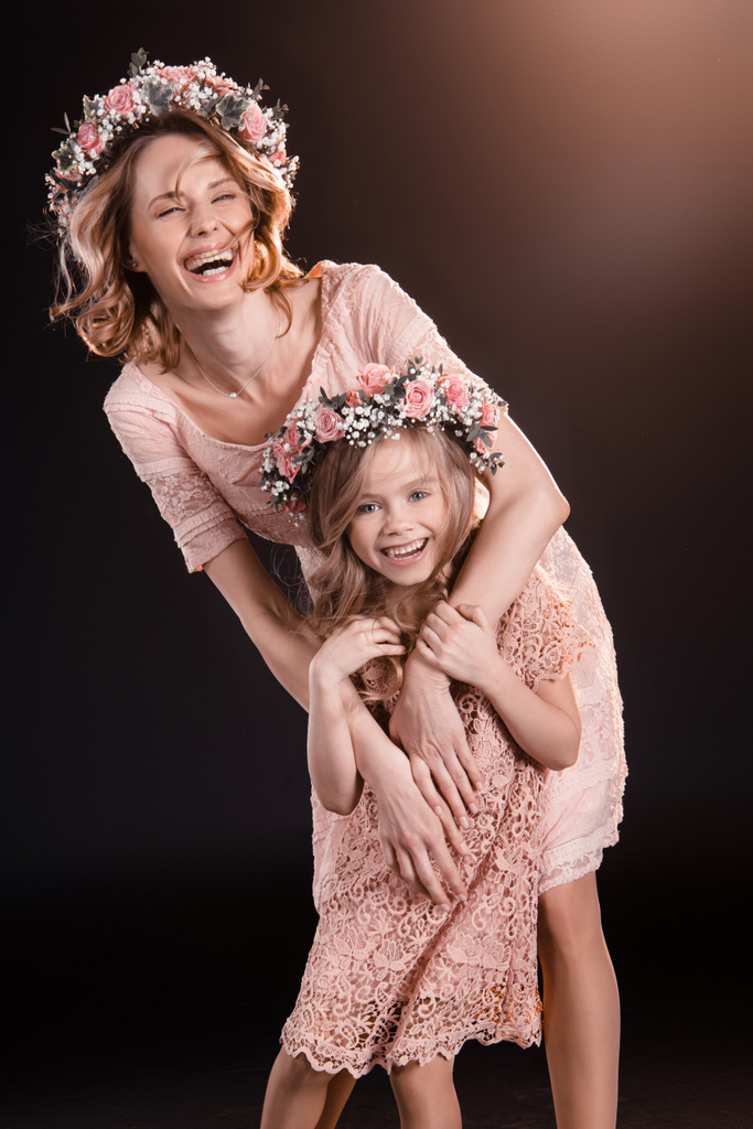 Mother and daughter in wreaths - Photo, Image