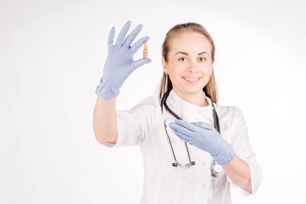 Doctor with hand in medical glove   - Photo, Image