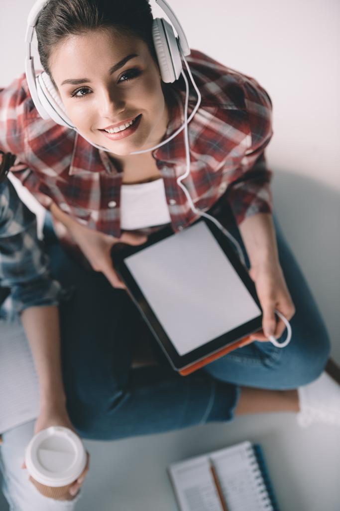 woman in headphones with tablet - Photo, Image