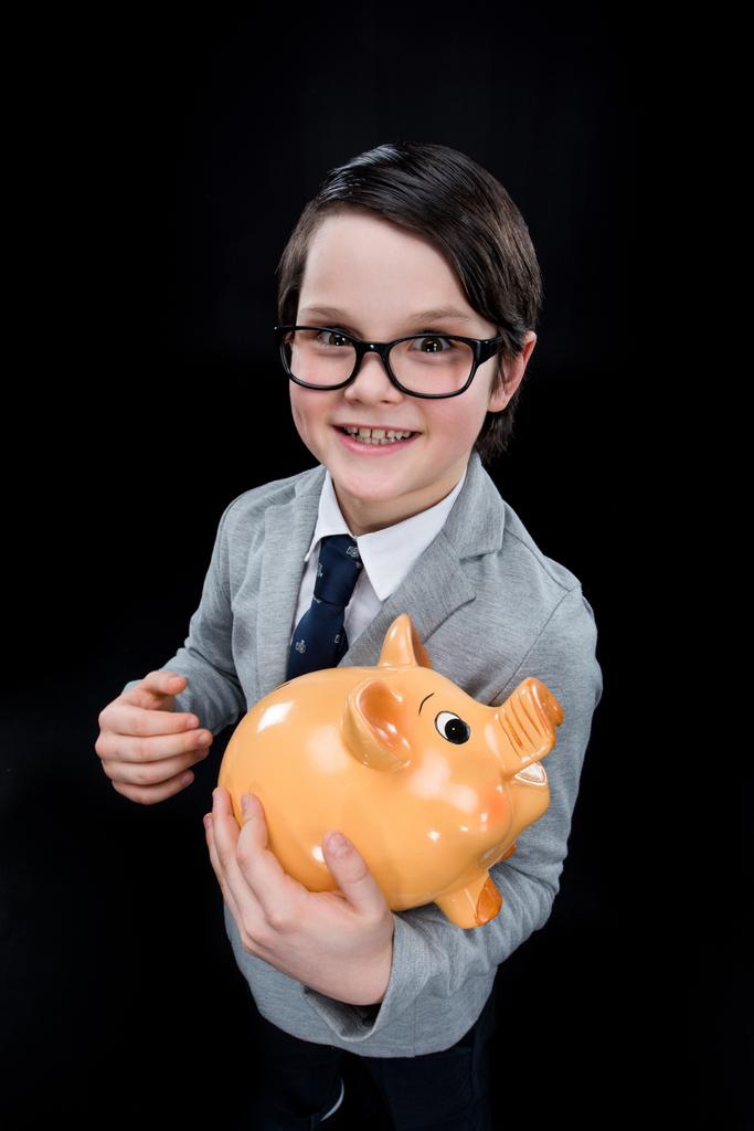 Boy with piggy bank - Photo, Image