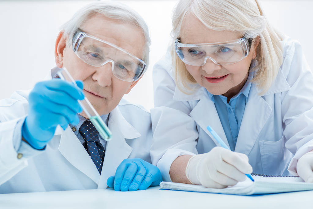 senior chemists with test tube - Photo, Image