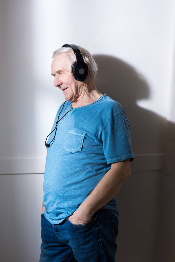 Senior man in headphones - Photo, Image