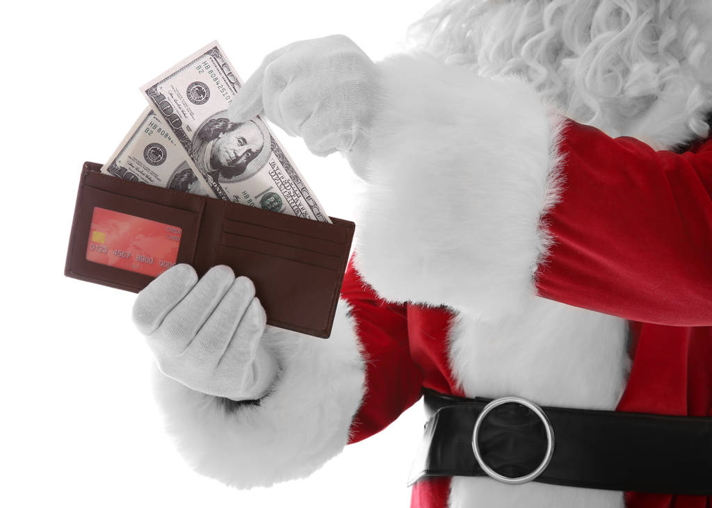 Санта-Клауса руки проведення гаманець  - Фото, зображення