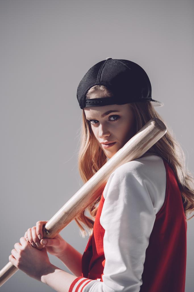 mulher com bastão de beisebol
  - Foto, Imagem