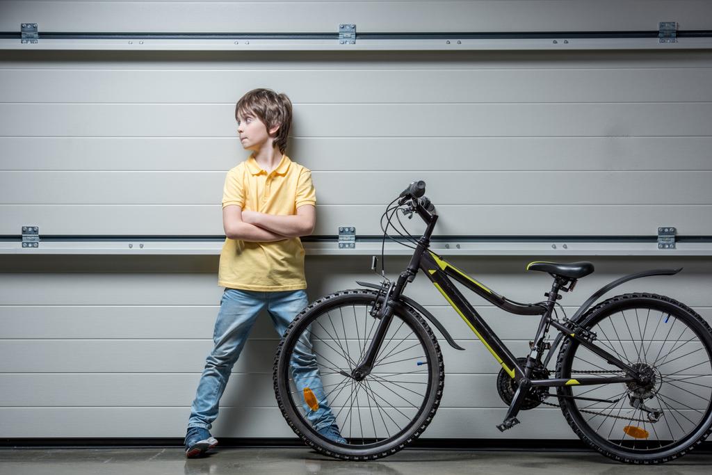 Adorable boy with bicycle - Photo, Image