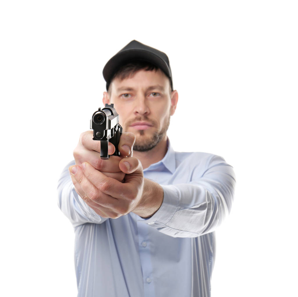 Охранник выстрелит из пистолета, изолированный на белом
 - Фото, изображение