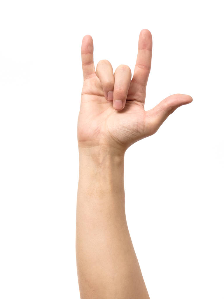 Hand giving the devil horns gesture - Photo, Image