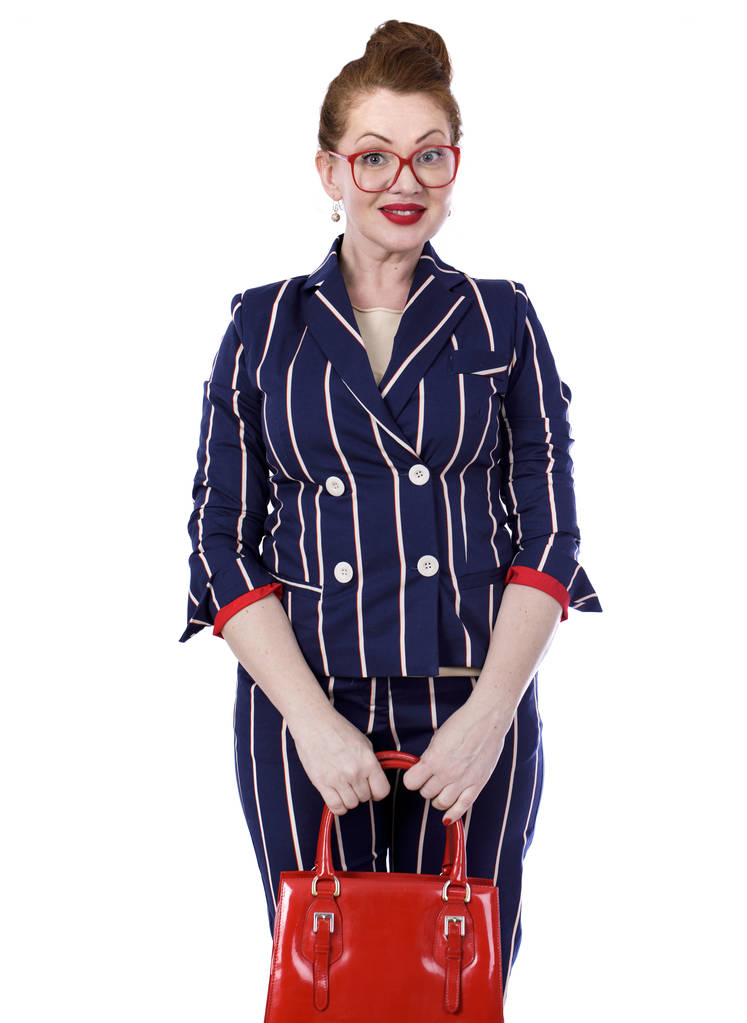 Stijlvolle middelbare leeftijd dame in indrukwekkende geruite pak  - Foto, afbeelding