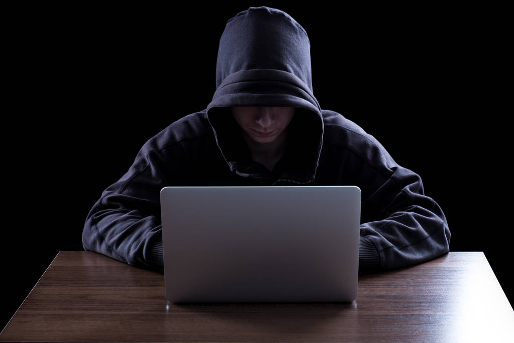 Anonymous hacker in the dark - Photo, Image