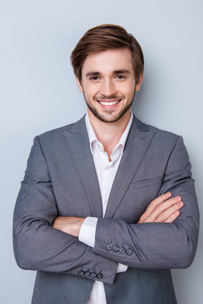 Portrait of successful handsome young man in suit with beaming s - Photo, Image