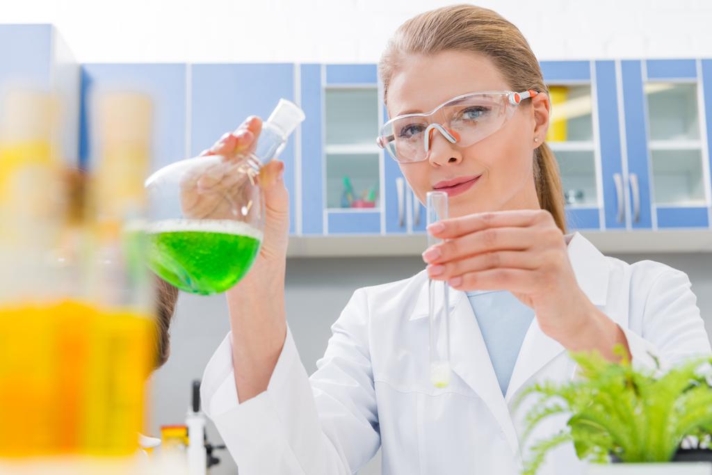 Scientist working with reagents  - Photo, Image