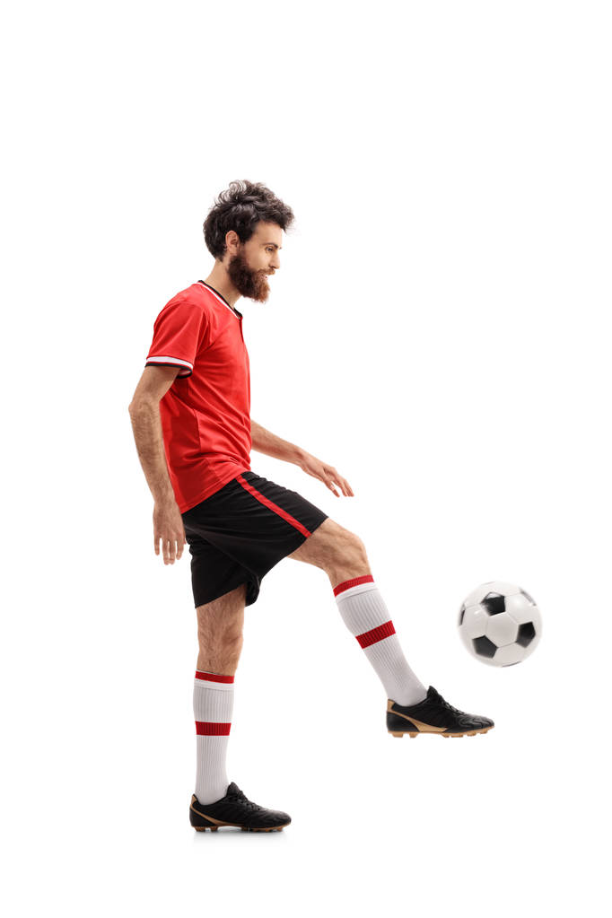 Brodaty facet żonglerka piłki nożnej - Zdjęcie, obraz