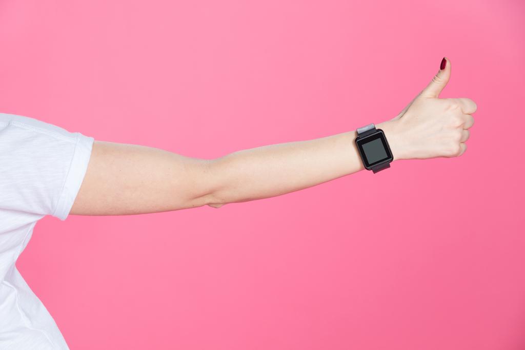 Žena s smartwatch ukazují palec  - Fotografie, Obrázek