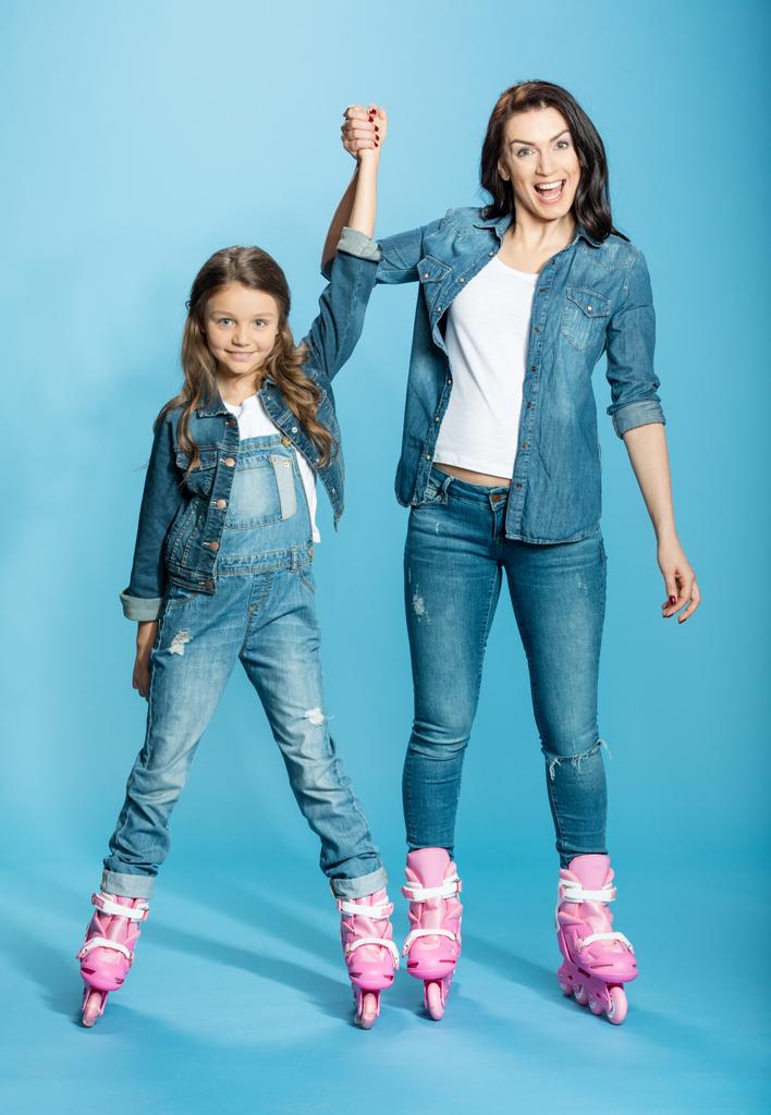 mother and daughter in roller skates - Photo, Image