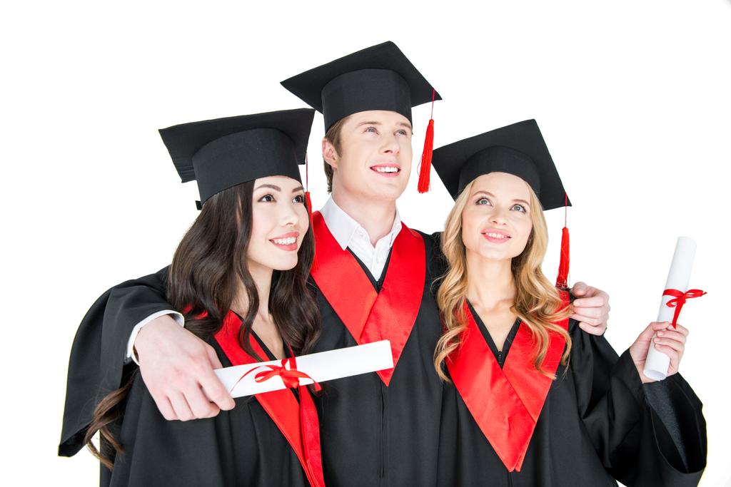 zufriedene Schüler mit Diplomen  - Foto, Bild