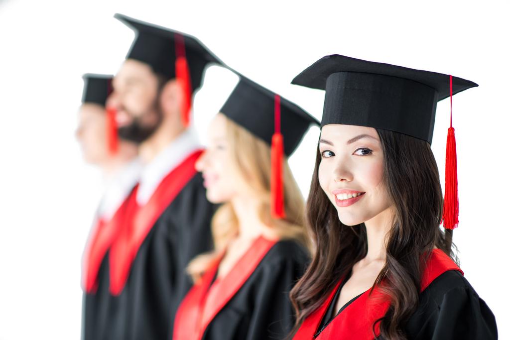 studente in berretto di laurea con diploma
 - Foto, immagini