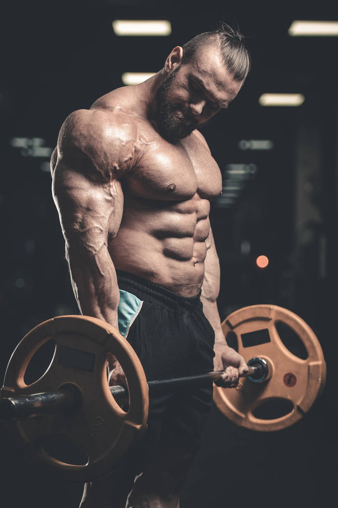 Hezký moc atletický muž na stravu školení se svaly čerpání - Fotografie, Obrázek