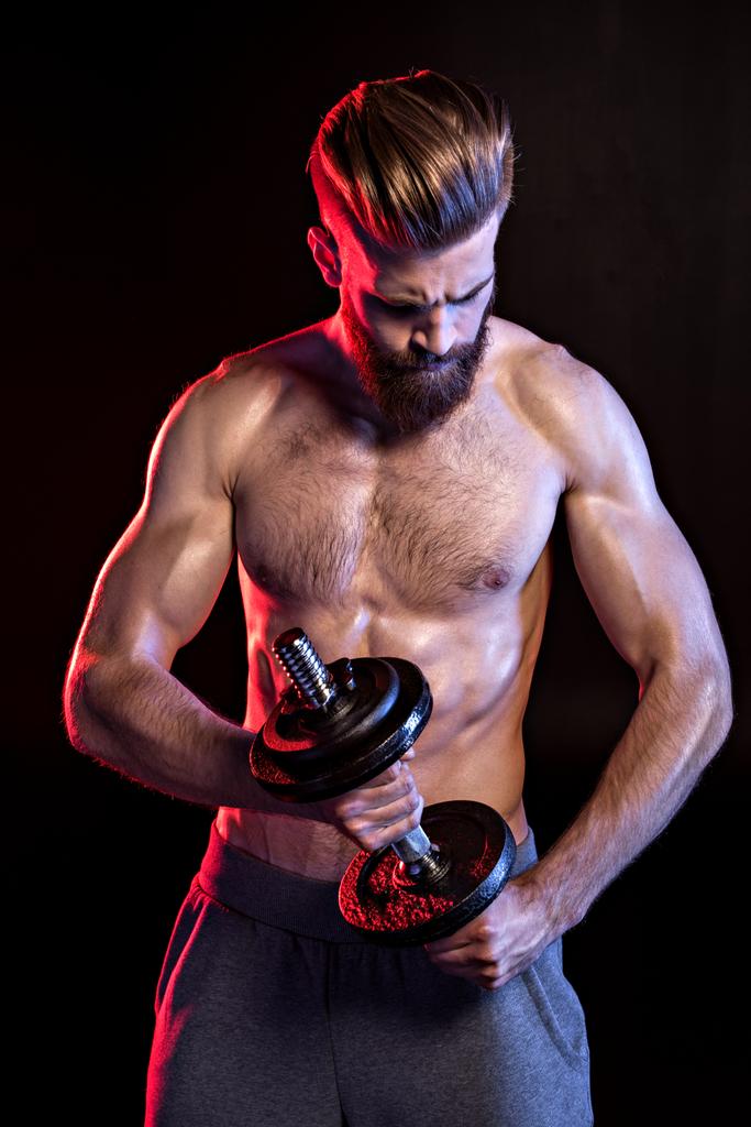 bodybuilder training with dumbbell - Photo, Image