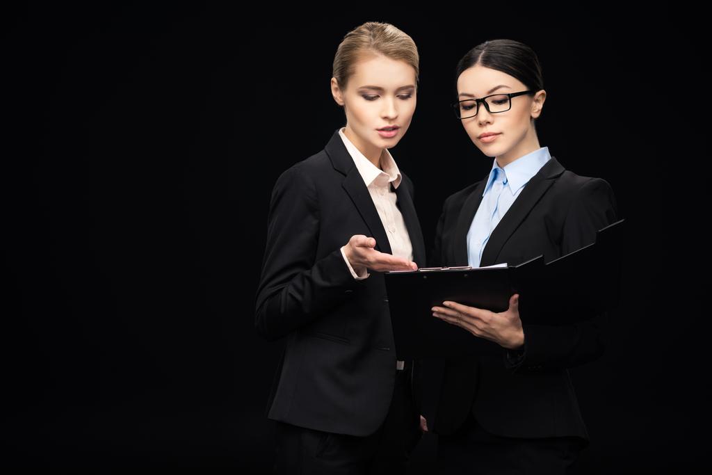 businesswomen connecting and holding clipboard - Photo, Image