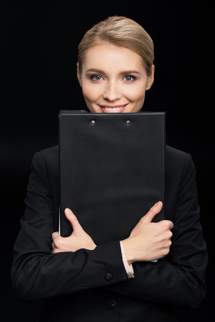 femme d'affaires avec bloc-notes dans les mains
 - Photo, image