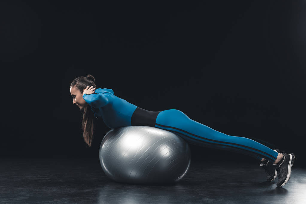 Sportswoman with fitness ball  - Photo, Image