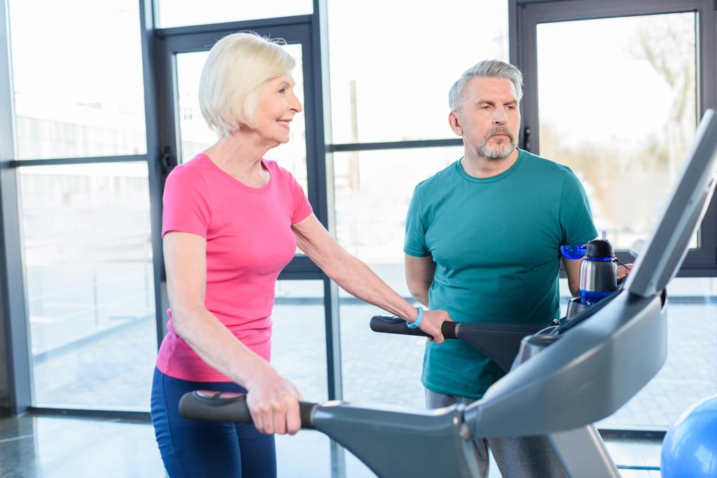 senior couple training on treadmill - Photo, Image