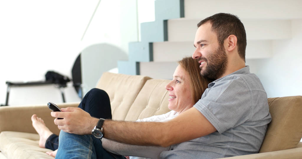 senoior couple watching tv in modern villa - Photo, Image