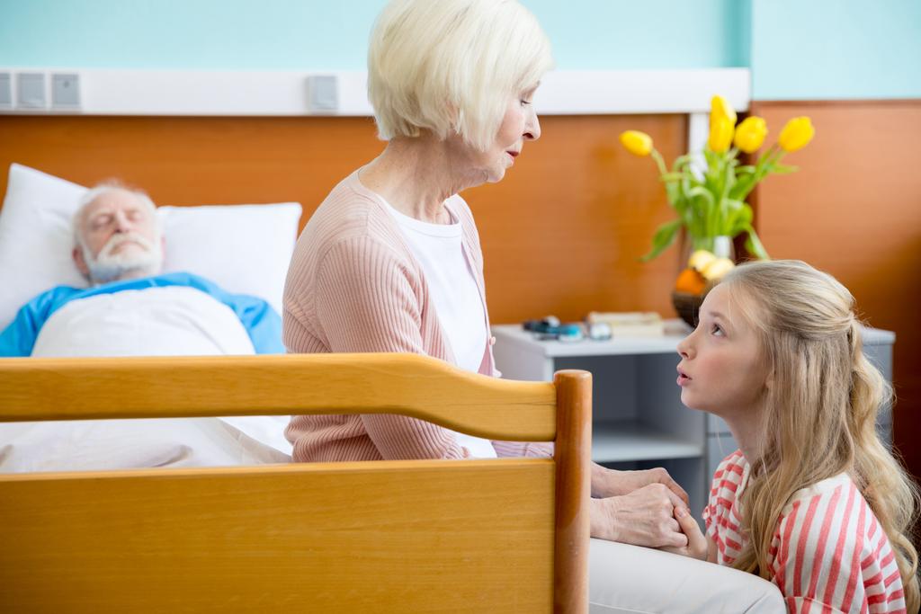 grandmother and granddaughter visiting patient  - Photo, Image