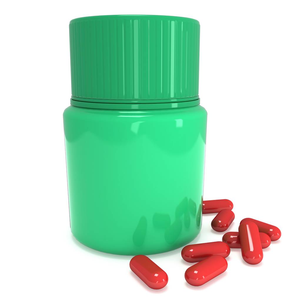 Green plastic bottle of pills - Photo, Image