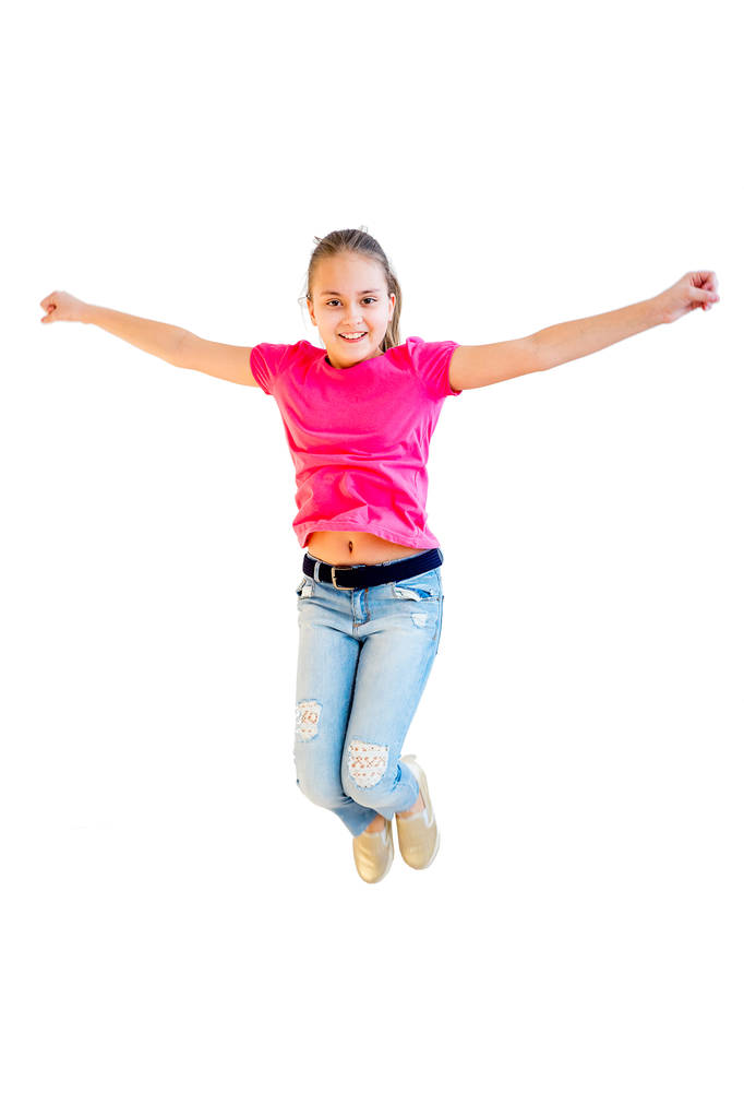 Ευτυχισμένο κορίτσι που πηδάει - Φωτογραφία, εικόνα