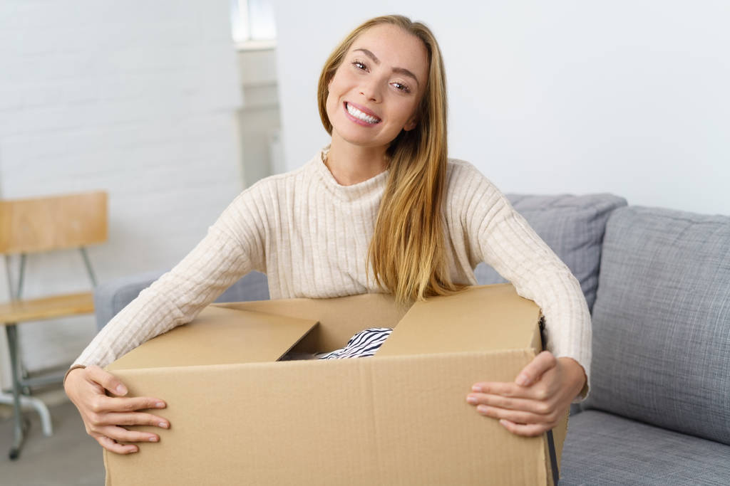 woman holding cardboard box  - Photo, Image
