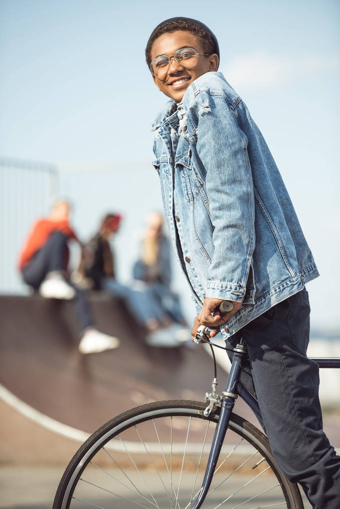 hipster boy riding bicycle - Photo, Image