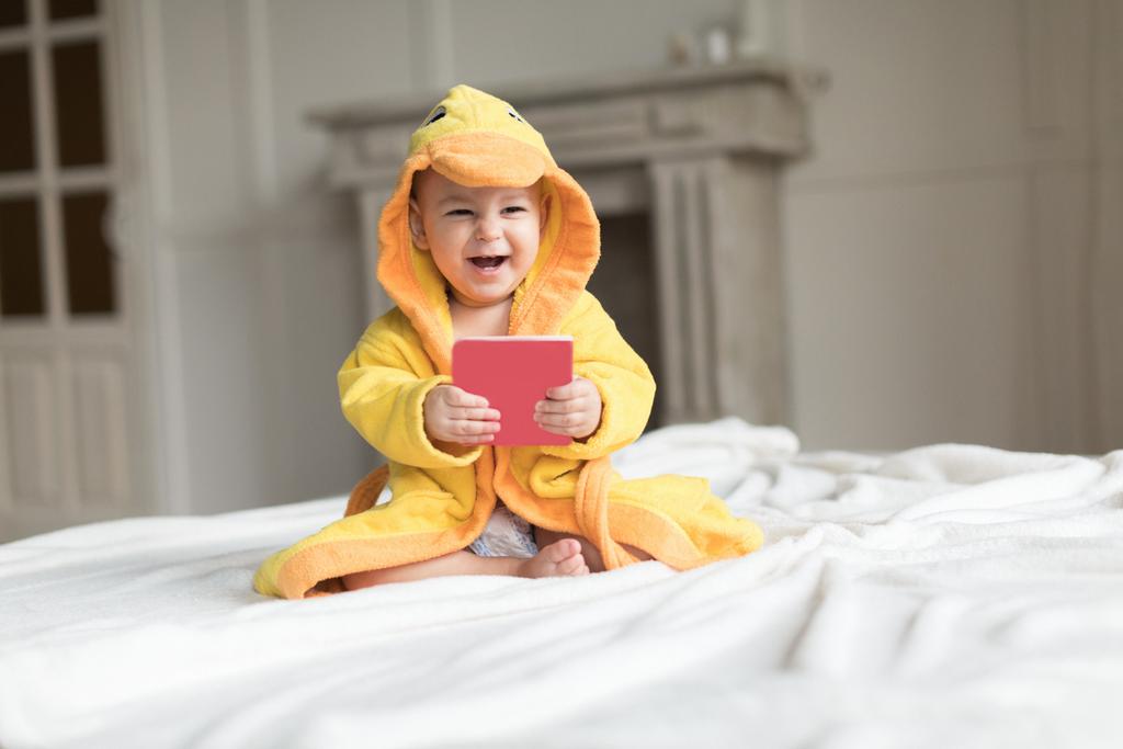 baby boy in yellow robe - Photo, Image